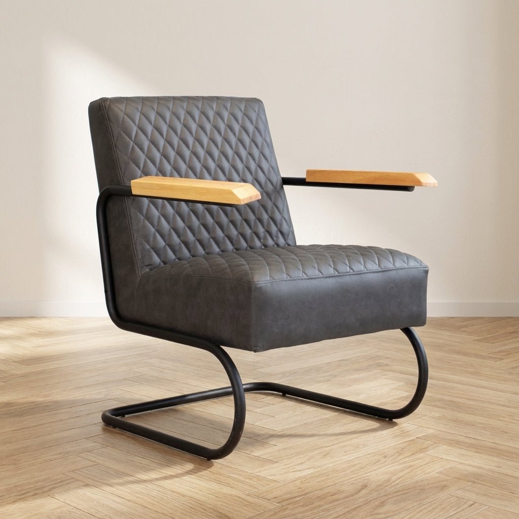Industrial armchair Lars anthracite atmospheric photo in a modern interior
