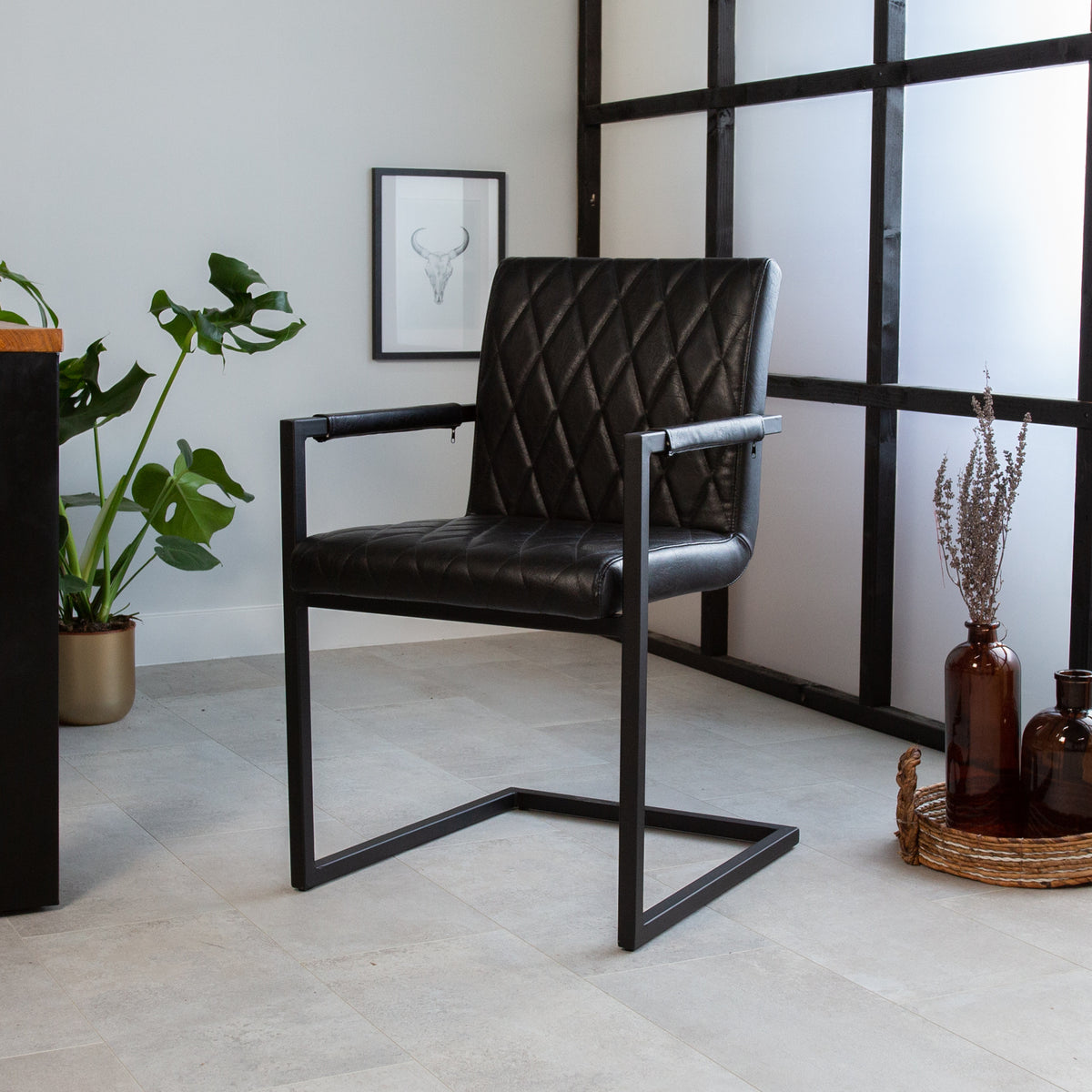 Dining room chair Ruben Dimehouse Black LxWxH 71x59x58 Faux leather Atmospheric photo diagonal front view