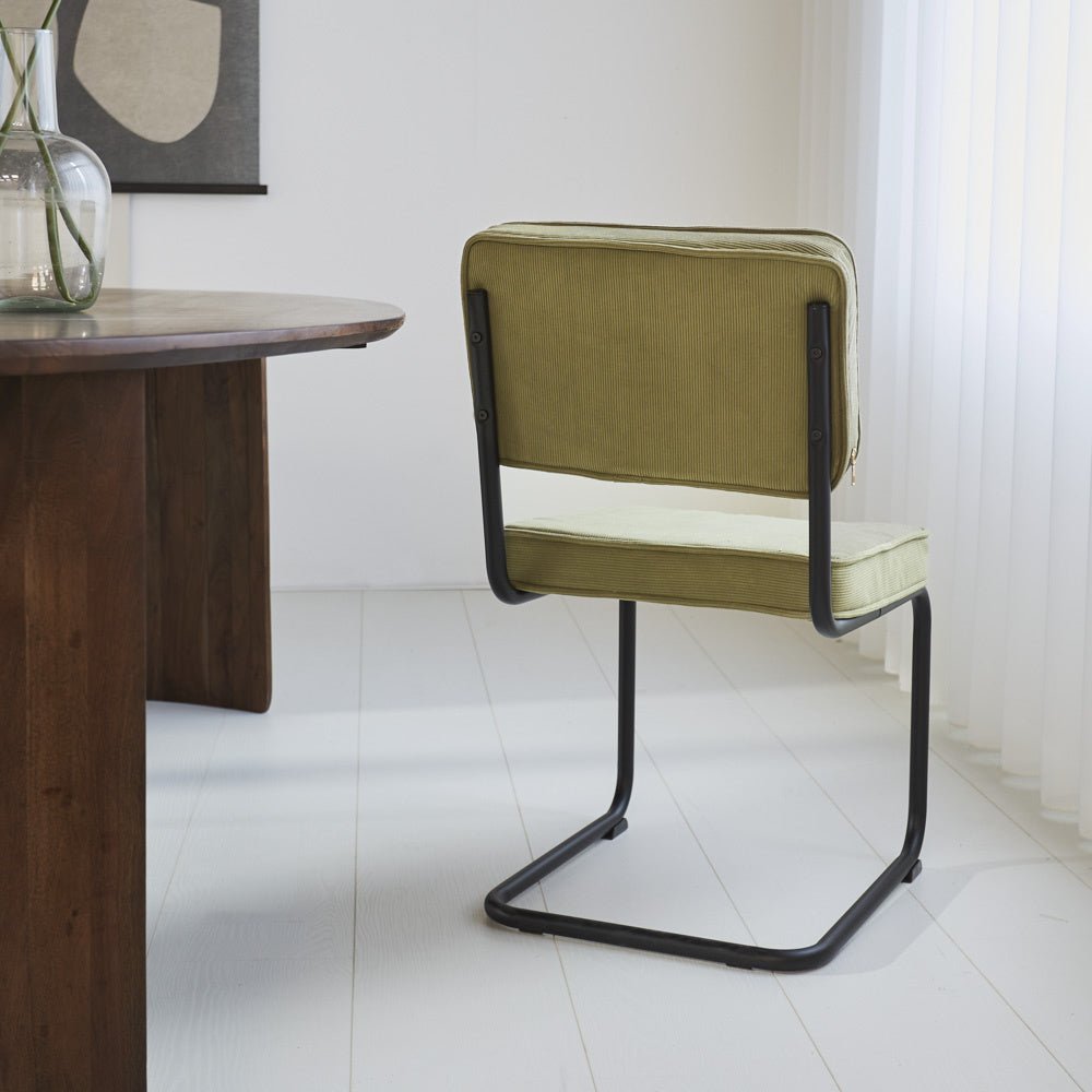 Dining room chair Remo ribbed fabric Dimehouse Green LxWxH 56x55x52 Rib fabric Atmospheric photo diagonal rear view