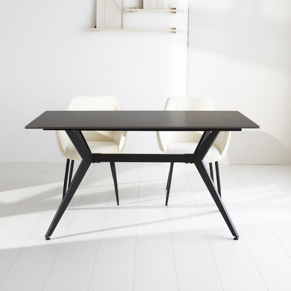 Dining table Grace Black Dimehouse Black LxWxH 160x94x13 Sintered stone Atmospheric photo diagonal front view