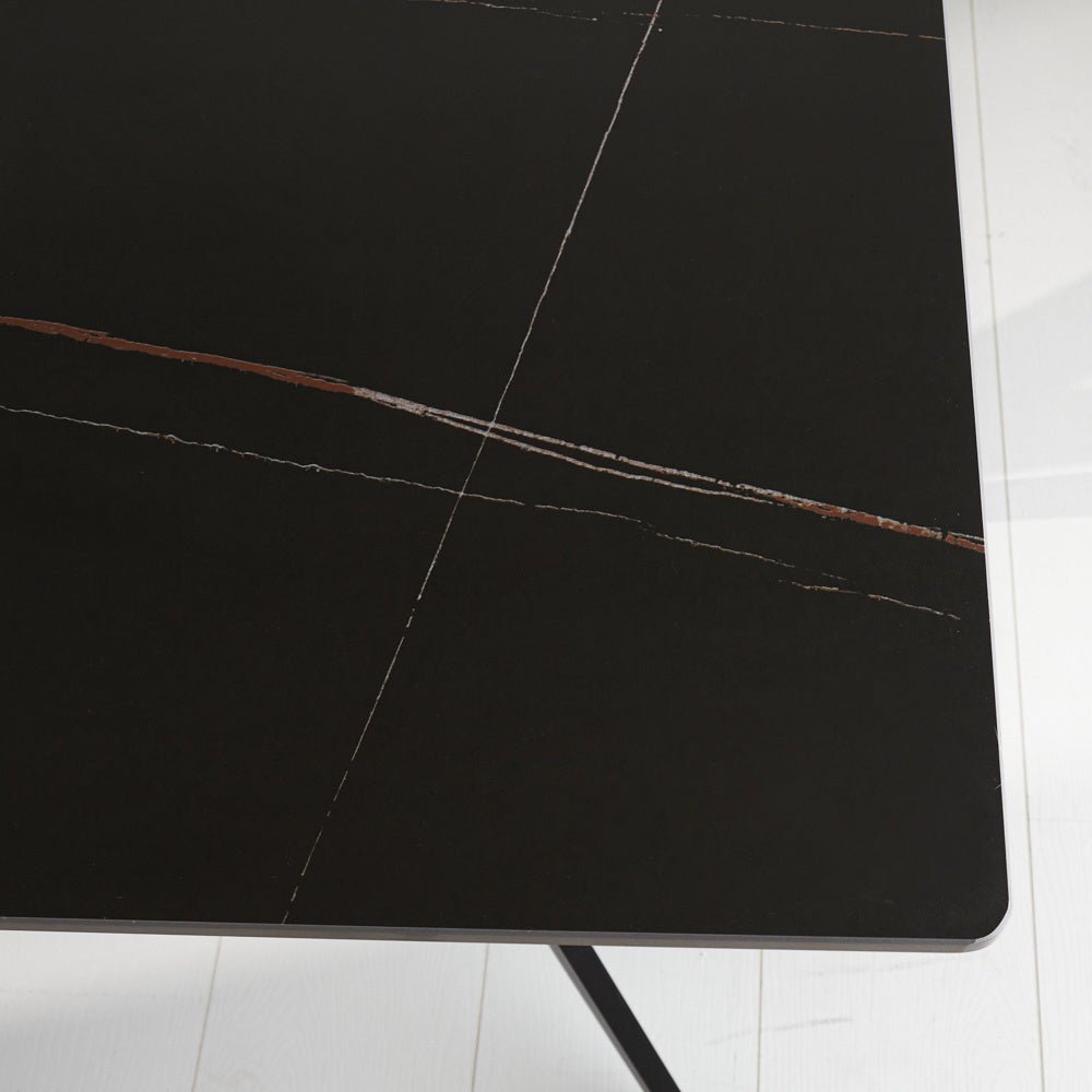 Dining table Grace Black Dimehouse Black Sintered stone Atmospheric photo diagonal front view