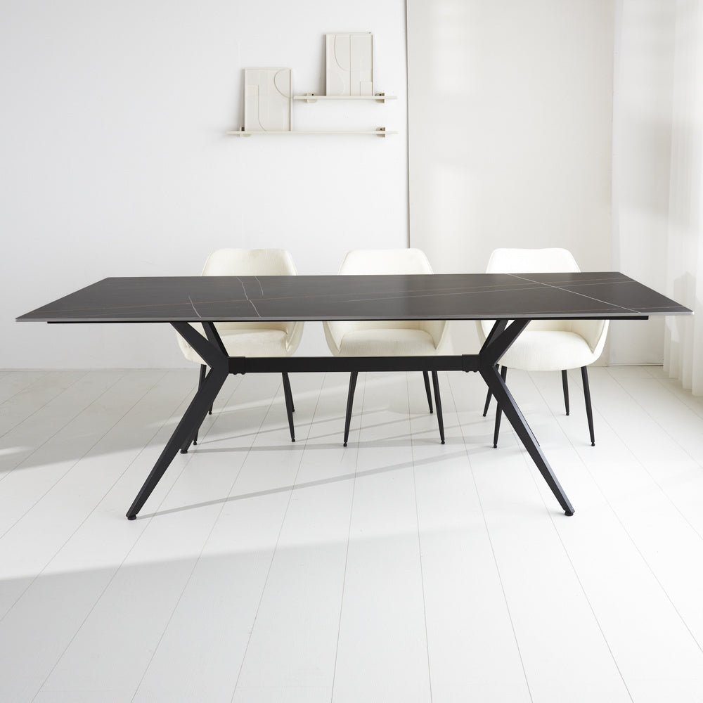 Dining table Grace Black Dimehouse Black Sintered stone Atmospheric photo diagonal front view
