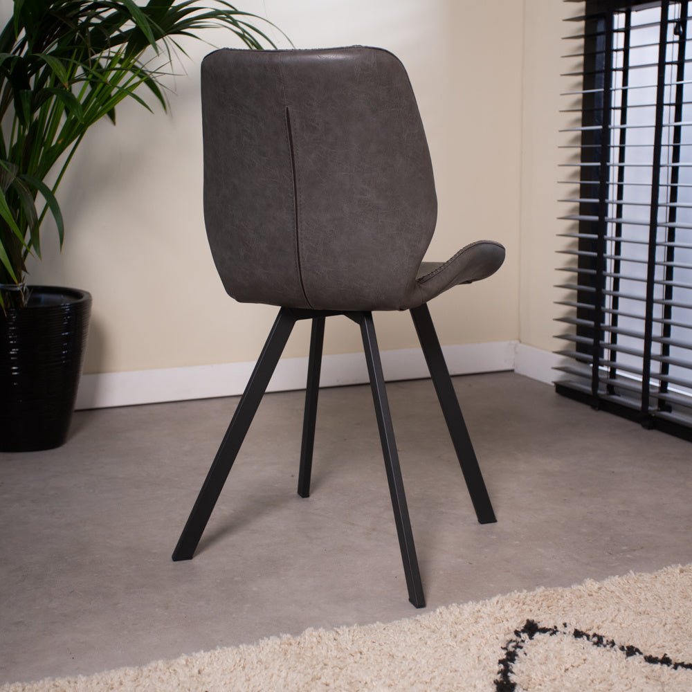 Dining room chair Barry Dimehouse Anthracite LxWxH 69x66x48 Faux leather Atmospheric photo diagonal rear view