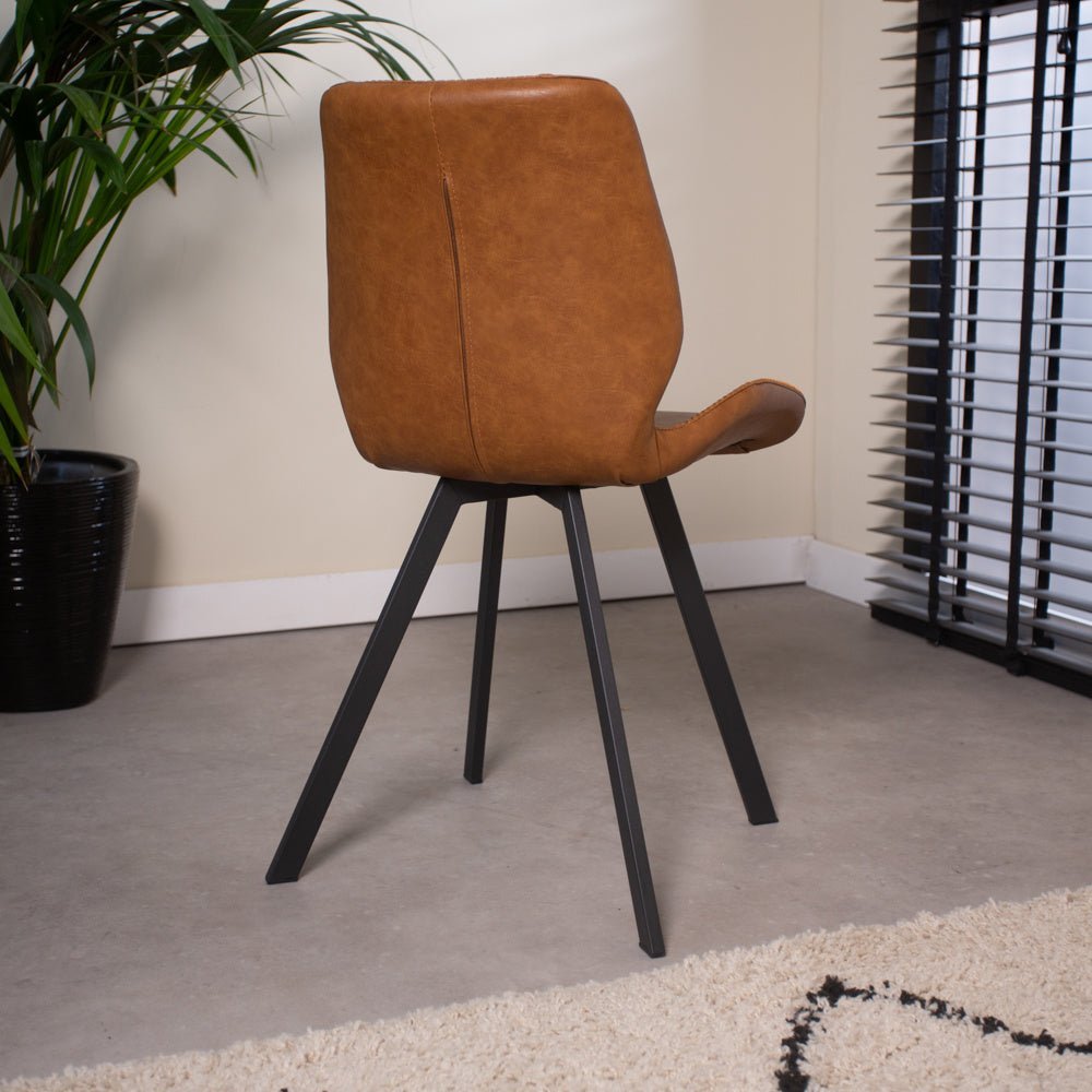 Dining room chair Barry Dimehouse Cognac LxWxH 69x66x48 Faux leather Atmospheric photo diagonal rear view