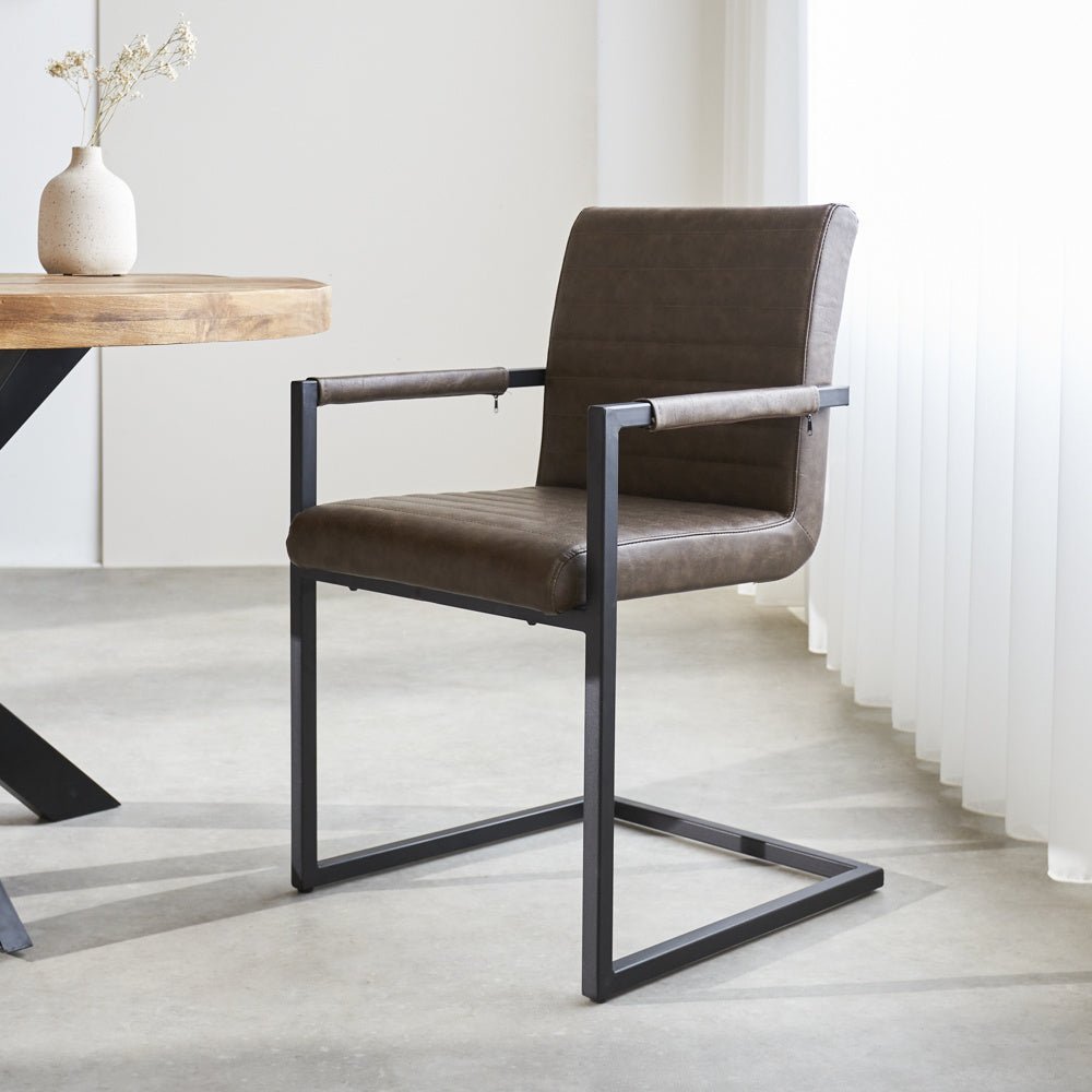 Dining room chair Kuba Dimehouse Taupe LxWxH 71x59x58 Faux leather Atmospheric photo diagonal front view