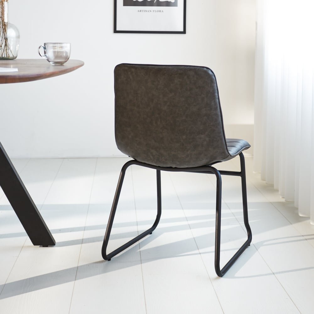 Dining room chair Mark Dimehouse Anthracite LxWxH 74x56x54 Faux leather Atmospheric photo diagonal rear view