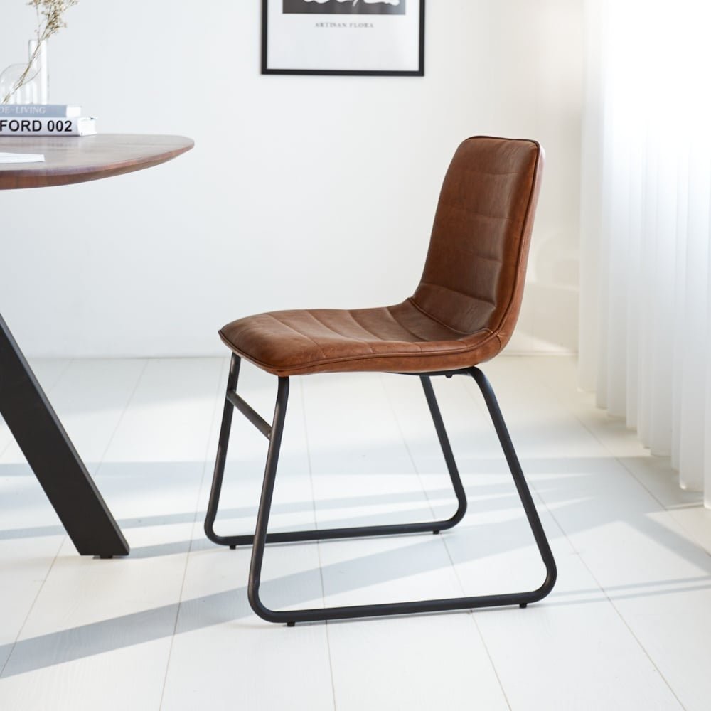 Dining room chair Mark Dimehouse Cognac LxWxH 74x56x54 Faux leather Atmospheric photo side view