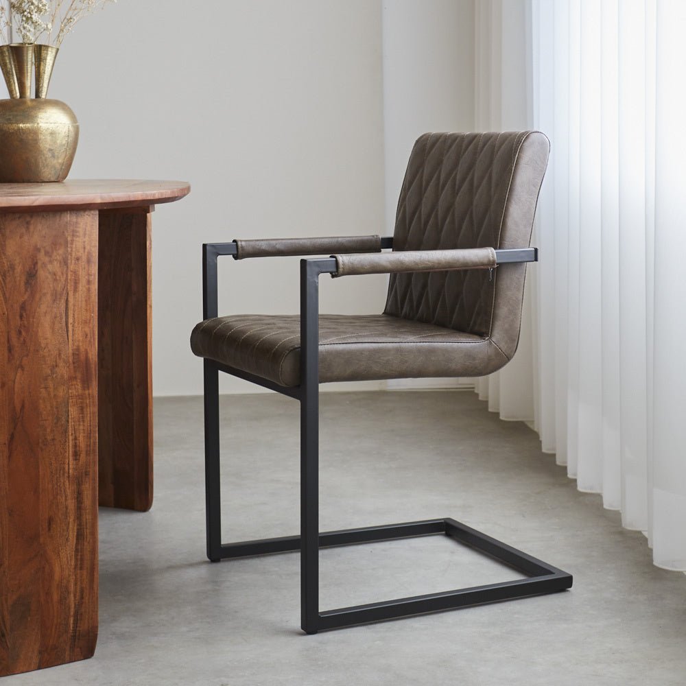 Dining room chair Ruben Dimehouse Taupe LxWxH 71x59x58 Faux leather Atmospheric photo side view