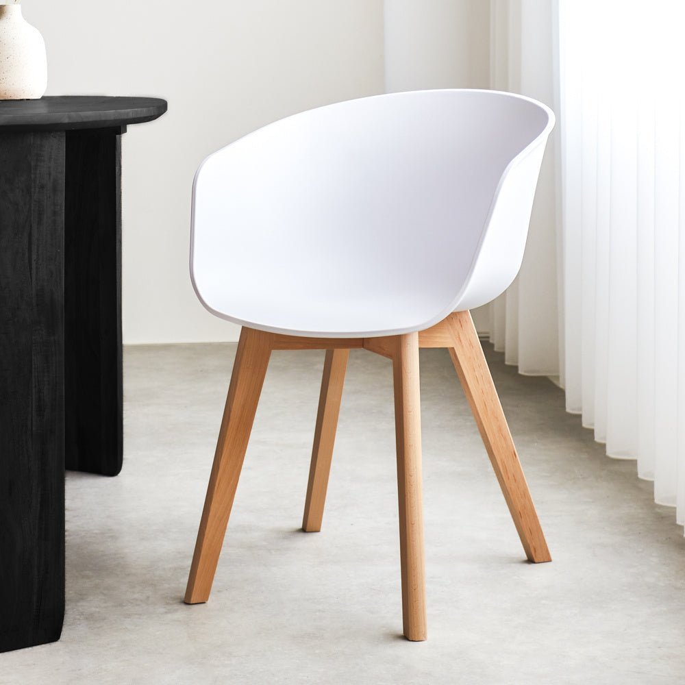 Herning dining room chair Dimehouse White LxWxH 68x60x51 Plastic Atmospheric photo diagonal front view