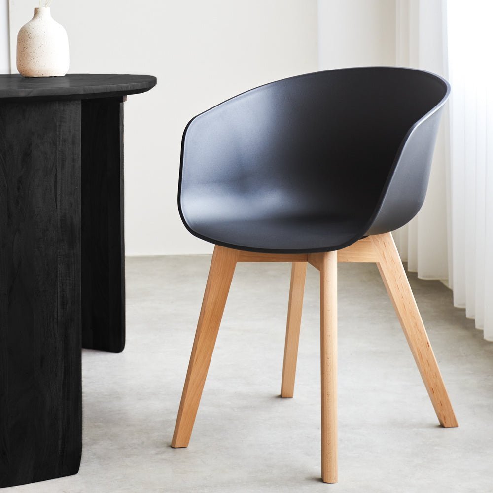 Herning dining room chair Dimehouse Black LxWxH 68x60x51 Plastic Atmospheric photo diagonal front view