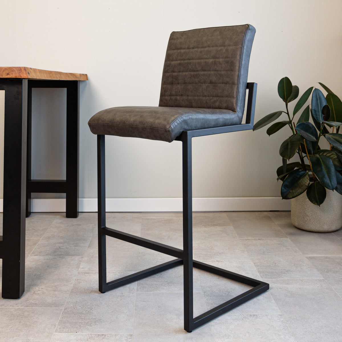 Barstool Kuba Dimehouse Anthracite LxWxH 93x58x53 Faux leather Atmospheric photo diagonal front view