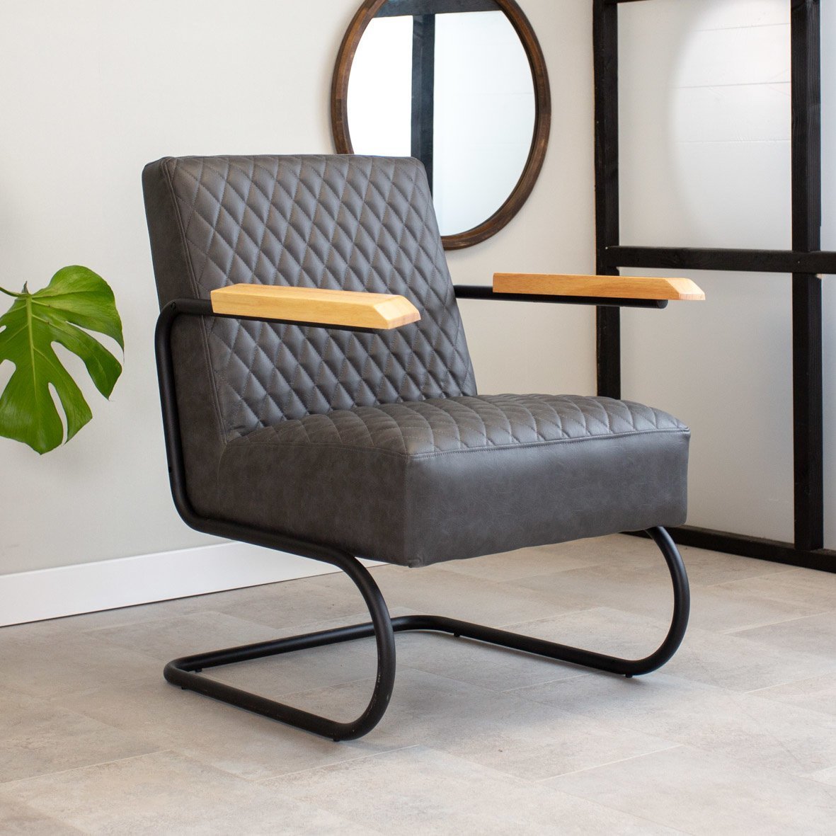 Armchair Lars Dimehouse Anthracite LxWxH 68x64x39 Faux leather Atmospheric photo diagonal front view