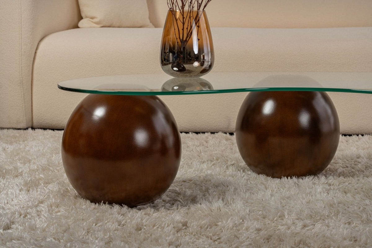 Coffee tables - Organic coffee table transparent glass walnut ball legs Sphere 120x70 cm - Dimehouse