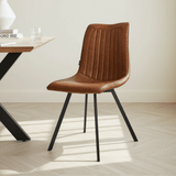 Dining room chair cognac in a modern interior