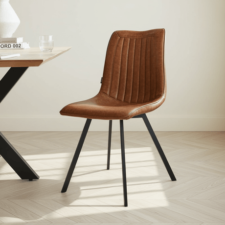 Dining room chair cognac in a modern interior