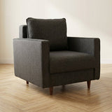 Armchair Eva Anthracite atmospheric photo in a modern interior
