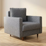 Armchair Eva Gray atmospheric photo in a modern interior