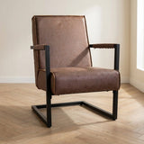 Industrial leather armchair taupe Tiger mood photo in a modern interior