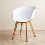 Scandinavian Dining Room Chair Herning White - Plastic Shell - Beech Wood Legs atmospheric photo in modern interior
