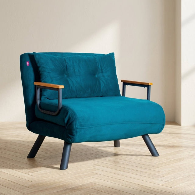 Sleeping armchair Sando Petrol Green atmospheric photo in a modern interior
