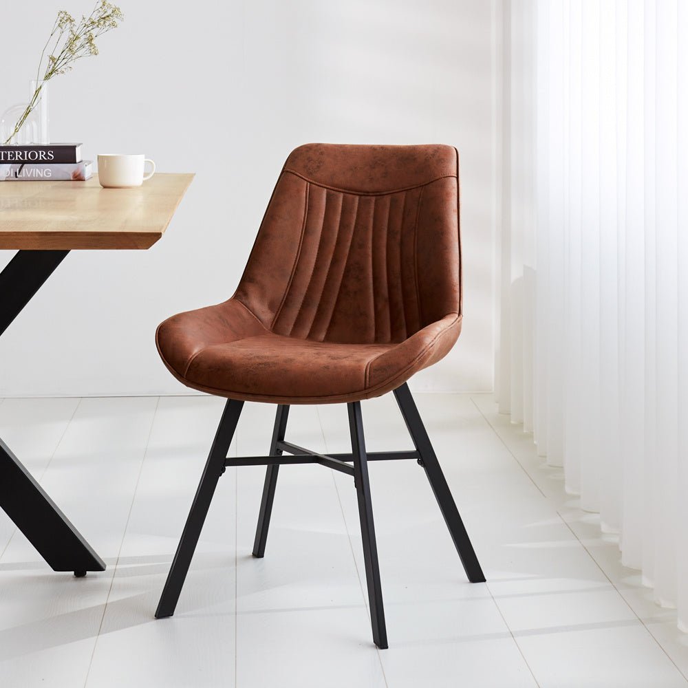 Dining room chair Jada Ecoleather Dimehouse Cognac LxWxH 79x57x53 Eco leather Atmospheric photo diagonal front view