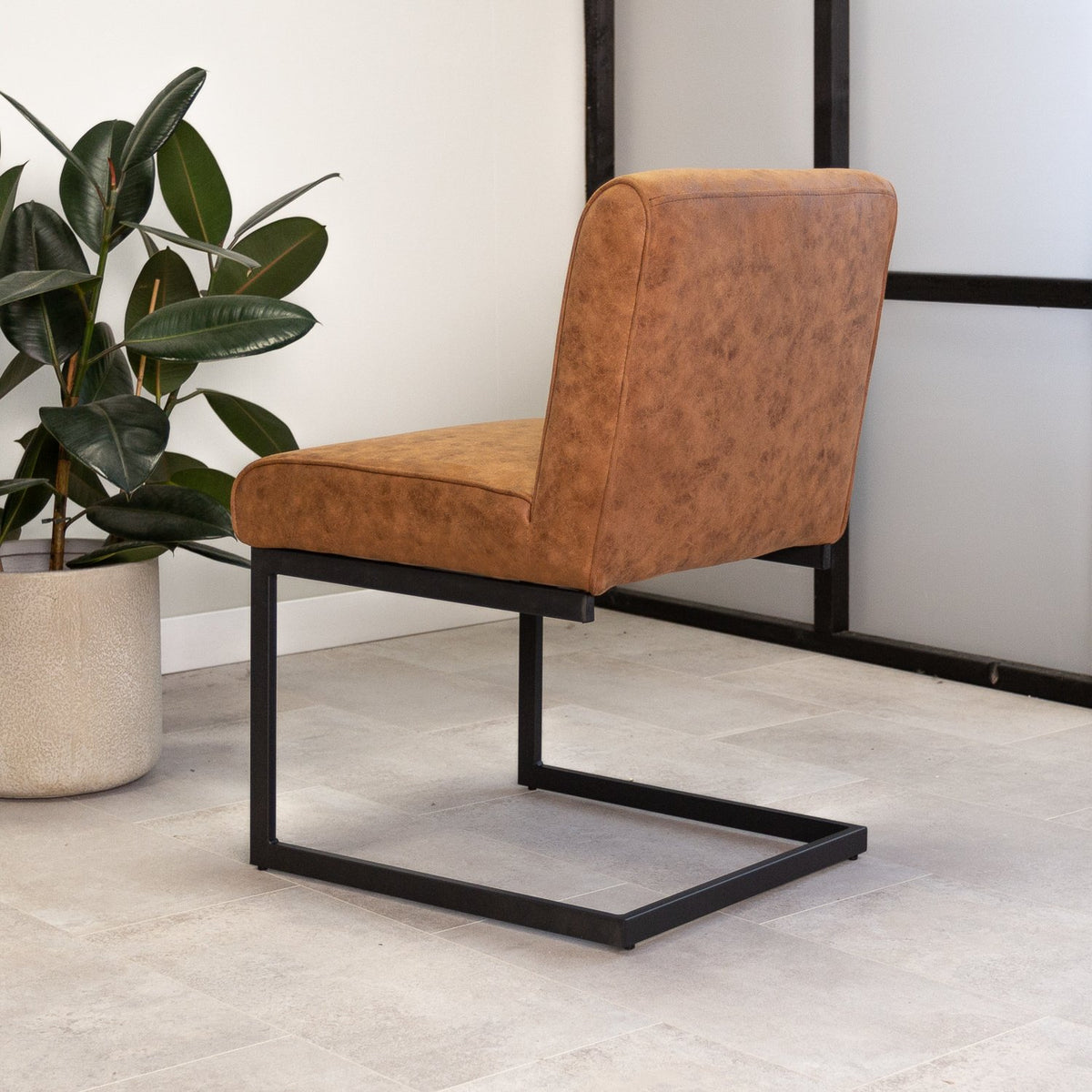 Dining room chair Nathan Dimehouse Cognac LxWxH 75x62x56 Fabric Atmospheric photo diagonal rear view