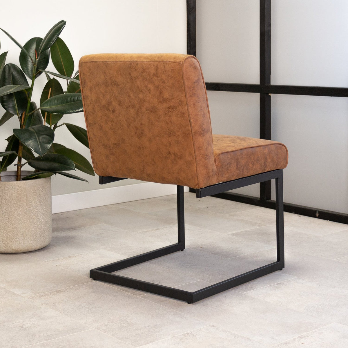 Dining room chair Nathan Dimehouse Cognac LxWxH 75x62x56 Fabric Atmospheric photo diagonal rear view