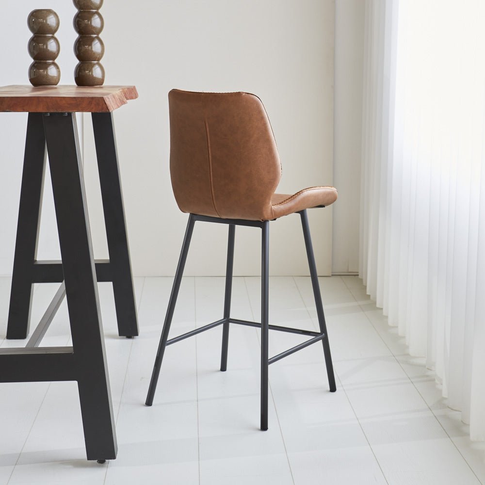 Bar stool Beau artificial leather Dimehouse Cognac LxWxH 84x54x52 Faux leather Atmospheric photo diagonal rear view