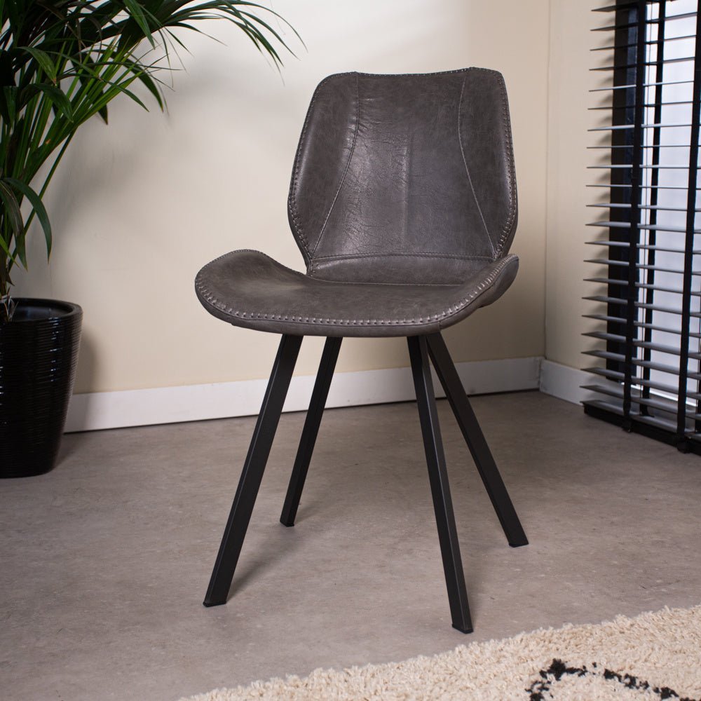 Dining room chair Barry Dimehouse Anthracite LxWxH 69x66x48 Faux leather Atmospheric photo diagonal front view