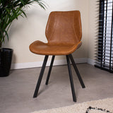 Dining room chair Barry Dimehouse Cognac LxWxH 69x66x48 Faux leather Atmospheric photo diagonal front view