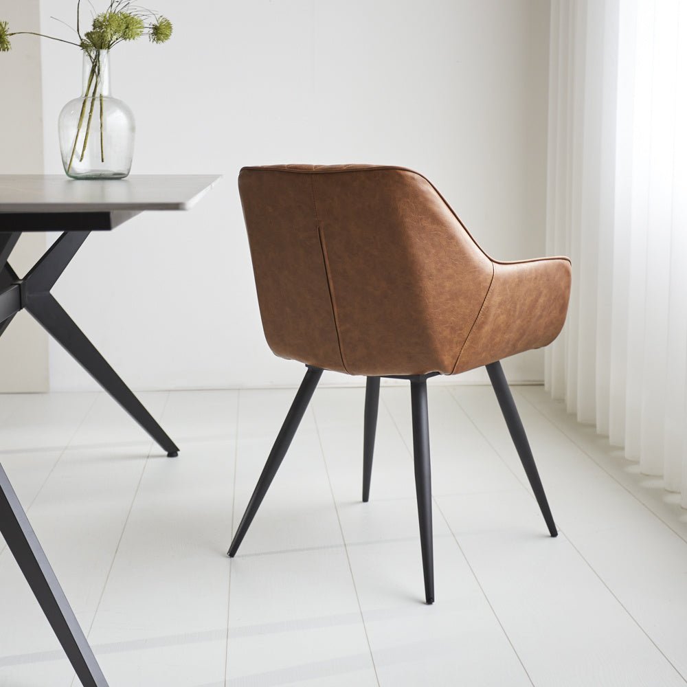 Dining room chair Cara Dimehouse Cognac LxWxH 78x65x57 Faux leather Atmospheric photo diagonal rear view