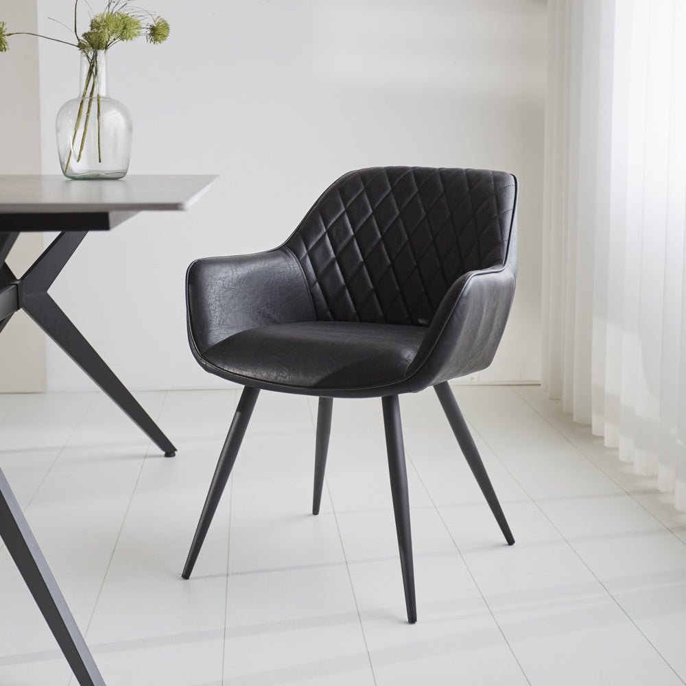 Dining room chair Cara Dimehouse Black LxWxH 78x65x57 Faux leather Atmospheric photo diagonal front view