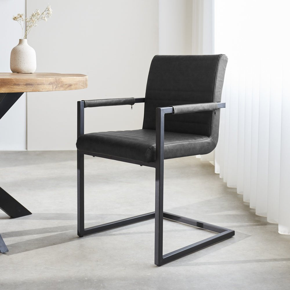 Dining room chair Kuba Dimehouse Anthracite LxWxH 71x59x58 Faux leather Atmospheric photo diagonal front view