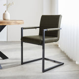 Dining room chair Kuba Dimehouse Green LxWxH 71x59x58 Faux leather Atmospheric photo diagonal front view