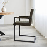 Dining room chair Kuba Dimehouse Green LxWxH 71x59x58 Faux leather Atmospheric photo side view