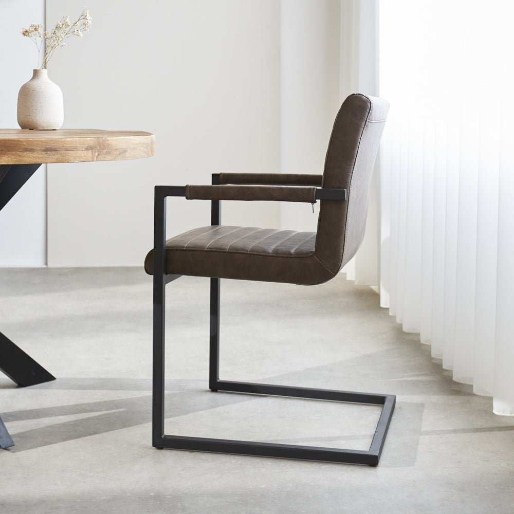 Dining room chair Kuba Dimehouse Taupe LxWxH 71x59x58 Faux leather Atmospheric photo side view
