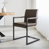 Dining room chair Kuba Dimehouse Taupe LxWxH 71x59x58 Faux leather Atmospheric photo diagonal front view
