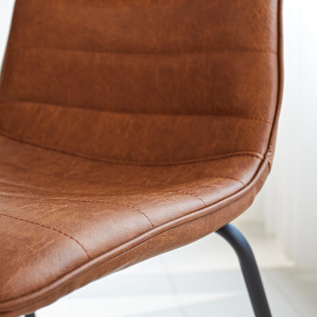 Dining room chair Mark Dimehouse Cognac LxWxH 74x56x54 Faux leather Atmospheric photo detail