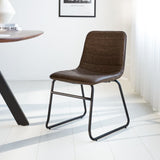 Dining room chair Mark Dimehouse Taupe LxWxH 74x56x54 Faux leather Atmospheric photo diagonal front view