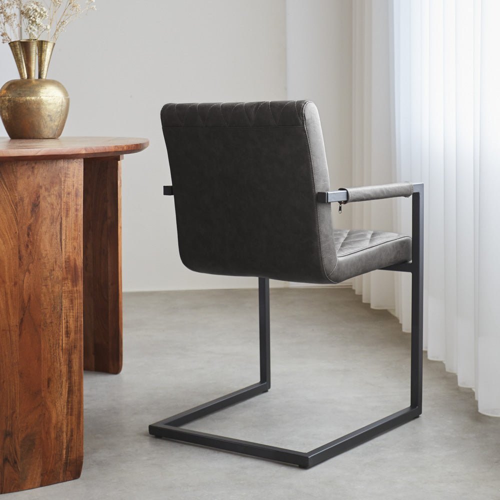 Dining room chair Ruben Dimehouse Anthracite LxWxH 71x59x58 Faux leather Atmospheric photo diagonal rear view