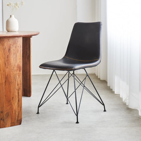 Dining room chair Viano Dimehouse Black LxWxH 64x61x52 Faux leather Atmospheric photo diagonal front view