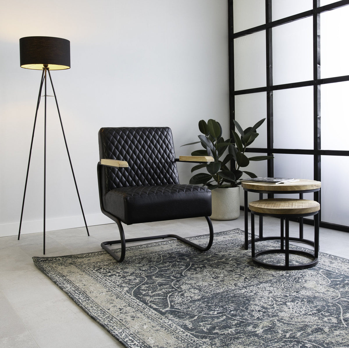 Armchair Lars Dimehouse Black LxWxH 68x64x39 Faux leather Atmospheric photo in situation