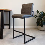 Barstool Kuba Dimehouse Anthracite LxWxH 93x58x53 Faux leather Atmospheric photo diagonal front view