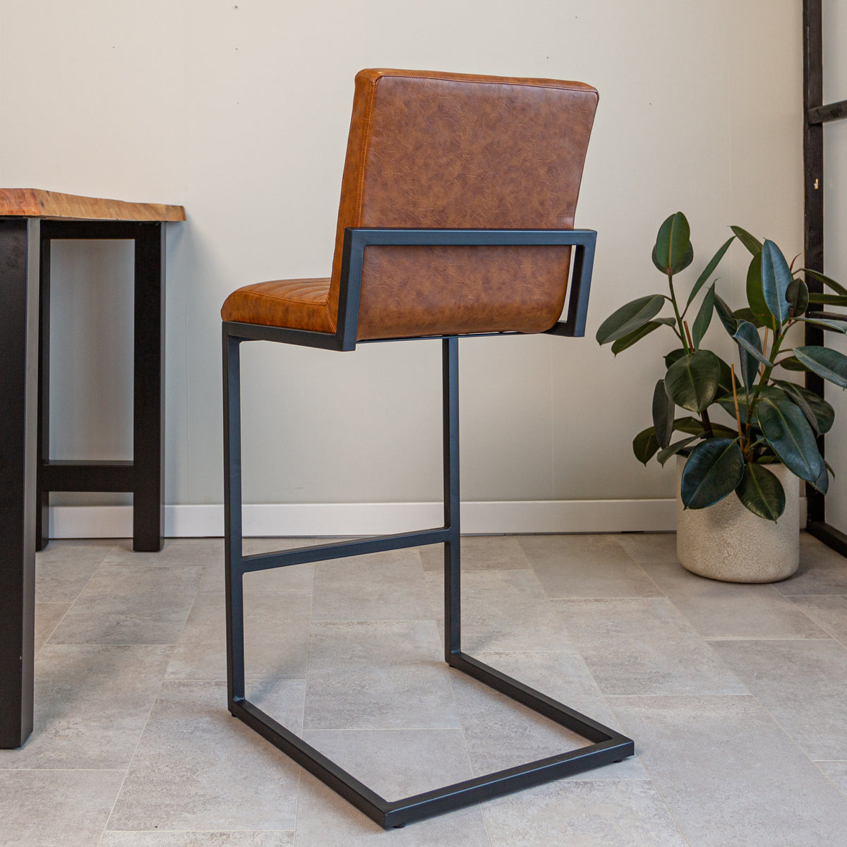 Barstool Kuba Dimehouse Cognac LxWxH 72x69x54 Faux leather Atmospheric photo diagonal rear view