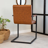 Dining room chair Kuba Dimehouse Cognac LxWxH 71x59x58 Faux leather Atmospheric photo diagonal rear view