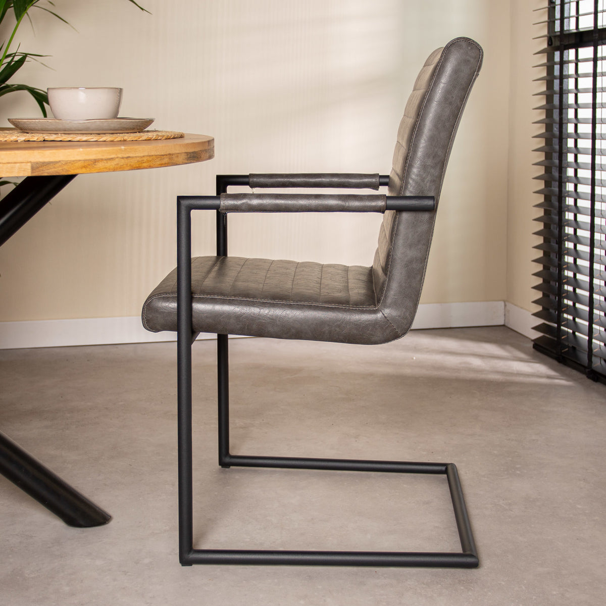 Dining room chair Bras Dimehouse Anthracite LxWxH 73x59x58 Faux leather Atmospheric photo diagonal rear view