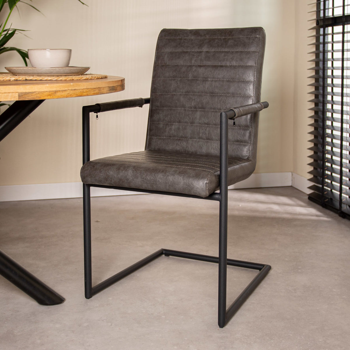 Dining room chair Bras Dimehouse Anthracite LxWxH 73x59x58 Faux leather Atmospheric photo diagonal front view