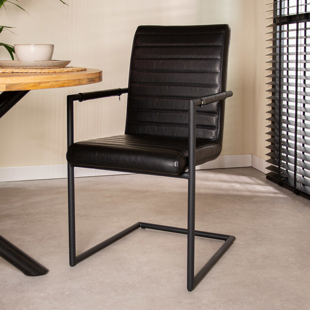 Dining room chair Bras Dimehouse Black LxWxH 73x59x58 Faux leather Atmospheric photo diagonal front view