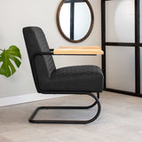 Armchair Lars Dimehouse Black LxWxH 68x64x39 Faux leather Atmospheric photo side view